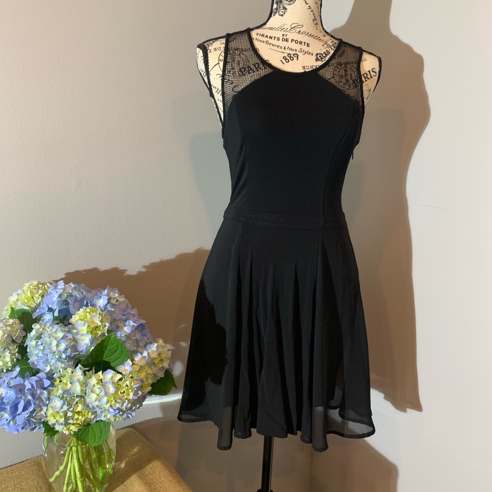 Black cocktail dress by Bebe